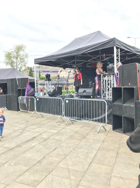 A live band performs on stage 